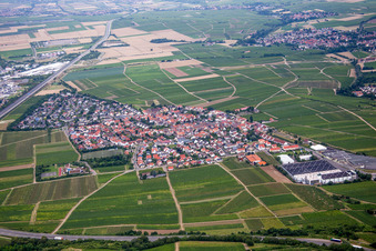 Aerial view of Village - view on the edge of agricultural fields and farmland in Tiefenthal in the state Rhineland-Palatinate, Germany