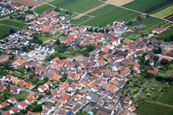 Village - view on the edge of agricultural fields and farmland in Goennheim in the state Rhineland-Palatinate, Germany