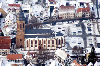 Wintry snowy Church building in of  church at the market in Old Town- center of downtown in Kandel in the state Rhineland-Palatinate
