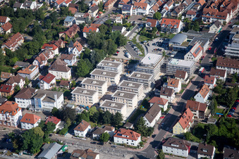 Construction site for City Quarters Building 'Im Stadtkern' in Kandel in the state Rhineland-Palatinate, Germany from the drone perspective
