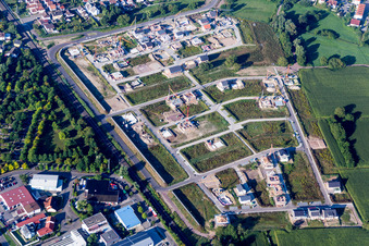 Construction sites for new construction residential area of detached housing estate In den Niederwiesen in Woerth am Rhein in the state Rhineland-Palatinate, Germany