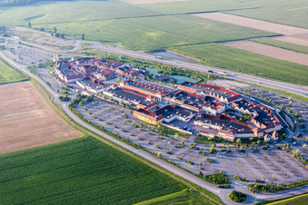 Building of the shopping center Roppenheim The Style Outlets in Roppenheim in Grand Est, France from the plane