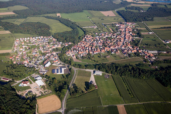 Aerial view of Village - view on the edge of agricultural fields and farmland in Herbsheim in Grand Est, France
