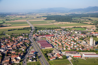 Aerial view of Village - view on the edge of agricultural fields and farmland in Kogenheim in Grand Est, France