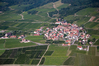 Aerial view of Village - view on the edge of agricultural fields and farmland in Dieffenthal in Grand Est, France