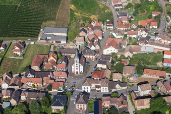 Aerial photograpy of Village - view on the edge of agricultural fields and farmland in Rorschwihr in Grand Est, France