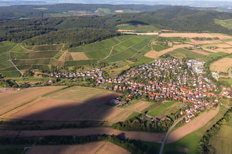 Aerial view of Village - view on the edge of agricultural fields and farmland in Vaihingen an der Enz in the state Baden-Wurttemberg, Germany