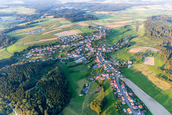 Village - view on the edge of agricultural fields and farmland in Zoznegg in the state Baden-Wurttemberg, Germany