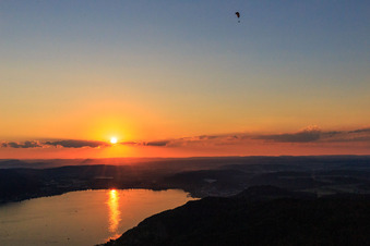 Aerial view of Sunset over Lake Überlingen with paraglider in Bodman-Ludwigshafen in the state Baden-Wuerttemberg, Germany