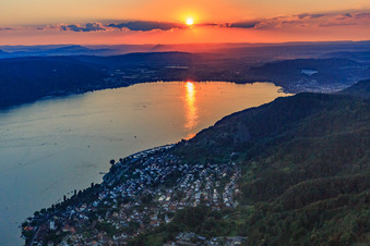 Aerial photograpy of Sunset over Lake Überlingen with paraglider in Bodman-Ludwigshafen in the state Baden-Wuerttemberg, Germany