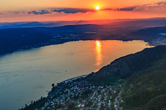 Oblique view of Sunset over Lake Überlingen with paraglider in Bodman-Ludwigshafen in the state Baden-Wuerttemberg, Germany