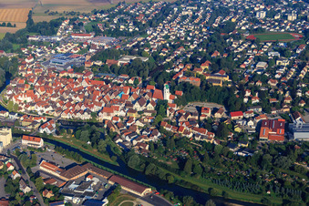 Overview of the historic old town above the Danube bank behind the Bleichegärten with the parish church of St. George in Riedlingen in the state Baden-Wuerttemberg, Germany