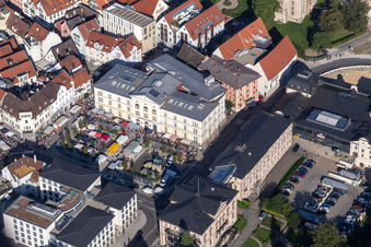Sale and food stands and trade stalls in the market place on weekly market on Leopoldplatz in Sigmaringen in the state Baden-Wurttemberg, Germany