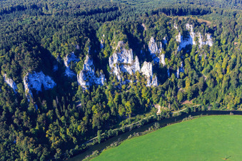 Rocks on the steep bank of the curved course of the Danube in the district Neidingen in Beuron in the state Baden-Wuerttemberg, Germany