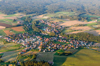 Village - view on the edge of agricultural fields and farmland in Herdwangen-Schoenach in the state Baden-Wurttemberg, Germany