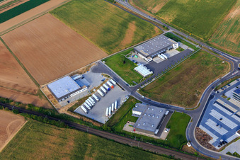 Industrial area in the Speyer Valley with Resinnovation GmbH, Markthalle 5, and TRANSAC International Shipping Company Ltd. in Rülzheim in the state Rhineland-Palatinate, Germany
