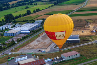 Aerial view of Hot air balloon PFALZGAS over the W II industrial park in Herxheim bei Landau in the state Rhineland-Palatinate, Germany