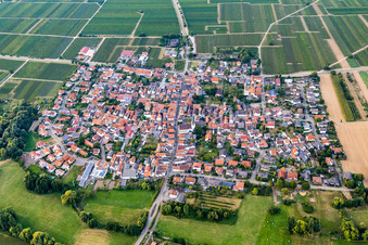 Village - view on the edge of agricultural fields and farmland in Venningen in the state Rhineland-Palatinate, Germany out of the air