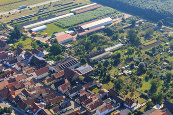 Agricultural halls at Ettenbaum in Kandel in the state Rhineland-Palatinate, Germany from the plane