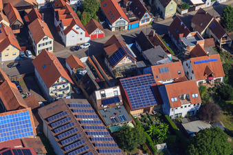 Barns with PV roofs on Rheinstr in Kandel in the state Rhineland-Palatinate, Germany seen from above