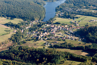 Village on the lake bank areas of Etang de Haspelschiedt in Haspelschiedt in Grand Est, France from above