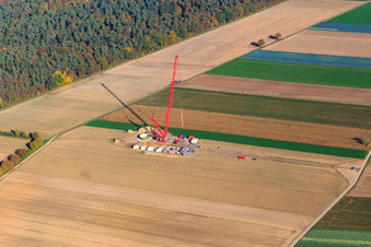 Construction site at the wind turbine foundation with crane in the wind farm Hatzenbühl in Hatzenbühl in the state Rhineland-Palatinate, Germany