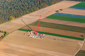 Aerial photograpy of Construction site at the wind turbine foundation with crane in the wind farm Hatzenbühl in Hatzenbühl in the state Rhineland-Palatinate, Germany