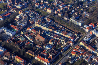 Aerial view of Town houses on the town square and parish church of St. Simon and Judas in Pfarrkirchen in the state Bavaria, Germany