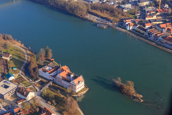 Oblique view of Castle Neuhaus am Inn with secondary school Maria Ward Neuhaus on an island in the Inn in Neuhaus am Inn in the state Bavaria, Germany