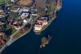 Castle Neuhaus am Inn with secondary school Maria Ward Neuhaus on an island in the Inn in Neuhaus am Inn in the state Bavaria, Germany from the plane