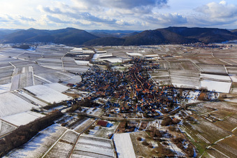 Village view in winter with snow from the east in Göcklingen in the state Rhineland-Palatinate, Germany
