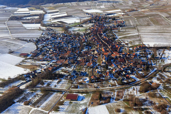 Village overview in winter with snow from the east in Göcklingen in the state Rhineland-Palatinate, Germany
