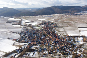 Winter snow-covered village view in Göcklingen in the state Rhineland-Palatinate, Germany
