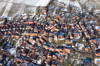 Aerial photograpy of Winter snow-covered village view in Göcklingen in the state Rhineland-Palatinate, Germany