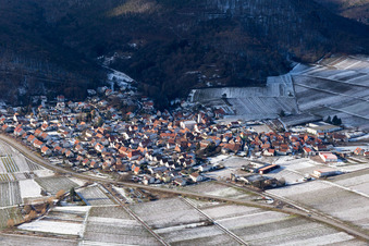 Aerial photograpy of View of a winegrowing village in winter with snow from the east in Eschbach in the state Rhineland-Palatinate, Germany