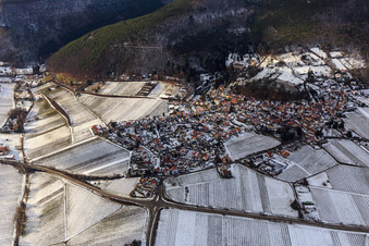 Aerial view of View of a winegrowing village on the edge of the Haardt in winter between snow-covered vineyards from the east in Gleisweiler in the state Rhineland-Palatinate, Germany