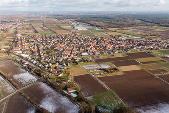 Village - view on the edge of agricultural fields and farmland in Zeiskam in the state Rhineland-Palatinate, Germany