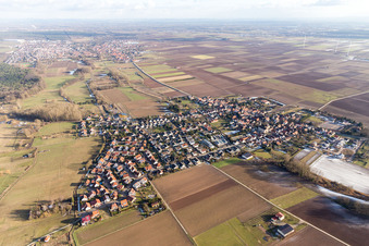 Village - view on the edge of agricultural fields and farmland in Knittelsheim in the state Rhineland-Palatinate, Germany