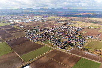 Village - view on the edge of agricultural fields and farmland in Ottersheim bei Landau in the state Rhineland-Palatinate, Germany