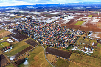 Village overview in winter with little snow from the southeast in Minfeld in the state Rhineland-Palatinate, Germany