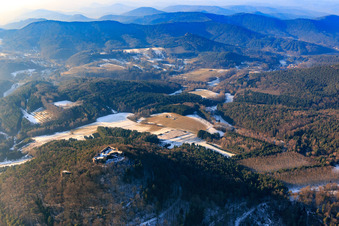 Aerial view of Lindelbrunn castle ruins in winter with little snow in Vorderweidenthal in the state Rhineland-Palatinate, Germany