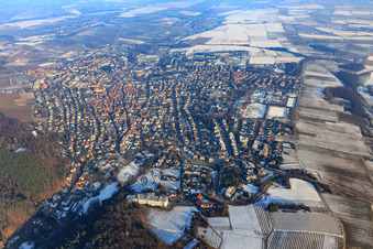 Aerial photograpy of City overview in winter with little snow from the west with spa park Bad Bergzabern at the Edith Stein Clinic in Bad Bergzabern in the state Rhineland-Palatinate, Germany
