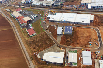 Aerial view of Industrial Park W II with HELLMANN Kunststoff- & Metallgrosshandel GmbH, Karsten Kremel joinery, PLAMECO stretch ceilings South Palatinate, transparent packaging Weber GmbH and Raiffeisen Agrarhandel Pfalz GmbH (Herxheim) in Herxheim bei Landau in the state Rhineland-Palatinate, Germany