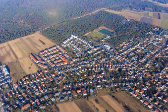 View of Bahnhofstraße from the south with sports field of SKG Bickenbach - Football Department in Bickenbach in the state Hesse, Germany