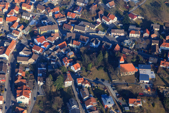 Aerial view of Nibelungenstraße in the village center with Protestant Church in the district Gadernheim in Lautertal in the state Hesse, Germany