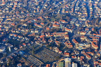 Town center and cemetery from the south in the district Höchst in  Odw. in Höchst im Odenwald in the state Hesse, Germany