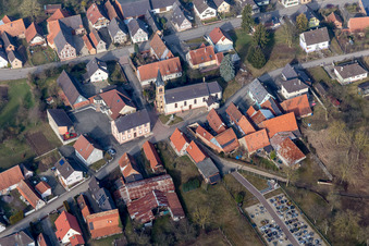 Aerial view of Village - view on the edge of agricultural fields and farmland in Siegen in Grand Est, France