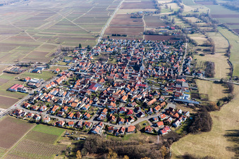Village - view on the edge of agricultural fields and farmland in Venningen in the state Rhineland-Palatinate, Germany seen from above