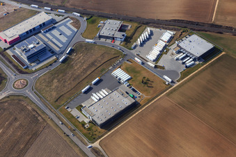 Industrial area in the Speyer Valley with ITK Engineering GmbH, TRANSAC International Shipping Company Ltd., Kardex Software GmbH, and Resinnovation GmbH in Rülzheim in the state Rhineland-Palatinate, Germany