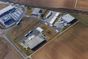 Aerial view of Industrial area in the Speyer Valley with ITK Engineering GmbH, TRANSAC International Shipping Company Ltd., Kardex Software GmbH, and Resinnovation GmbH in Rülzheim in the state Rhineland-Palatinate, Germany